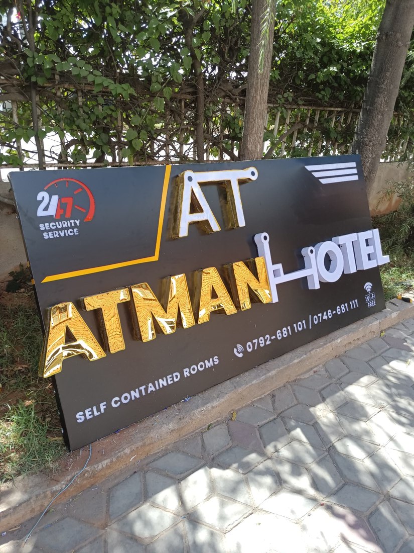 Atman Hotel signage