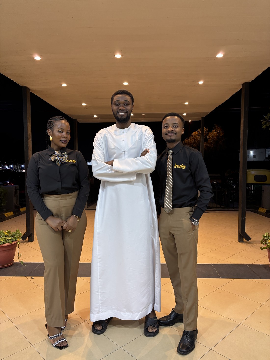 Invio scanning team welcoming a guest at an event